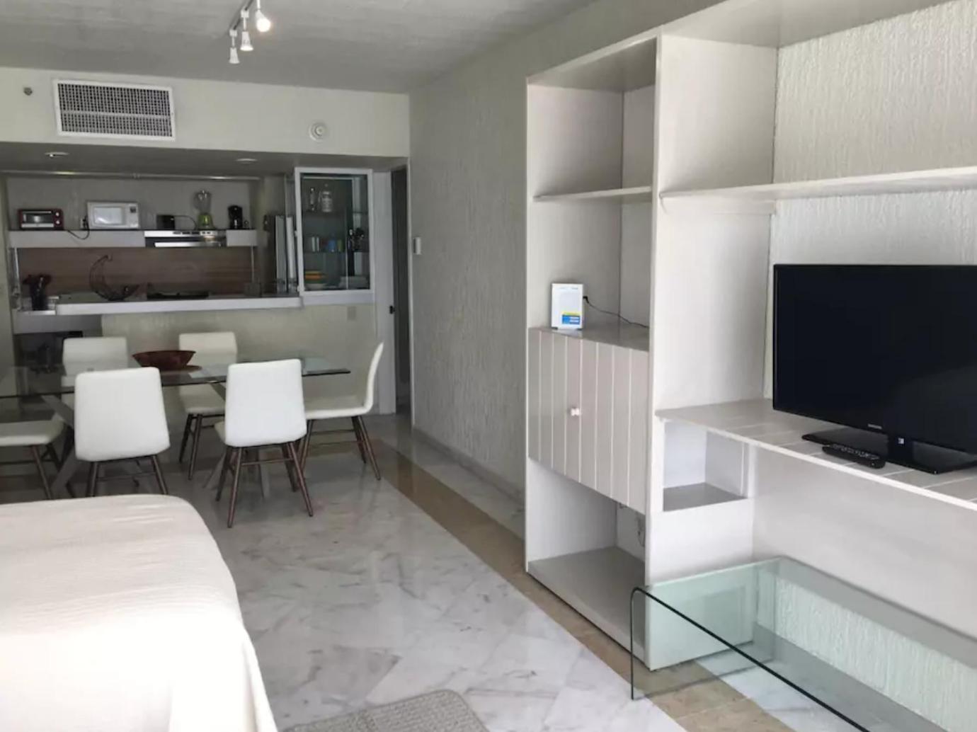 Amplio condominio frente al mar Cancún Habitación foto